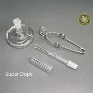 The Rogue Wax Works 14mm Quartz Cap showing the cap, bowl, tongs, and super dope stand